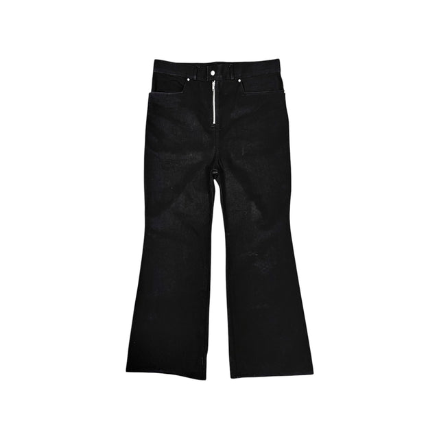 Front view of the LOVANT black UNIFORM flared denim, laid flat, showing the exposed silver zip fly and flared leg.