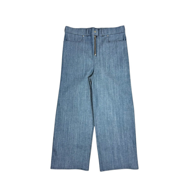 Front view of the LOVANT blue UNIFORM wide leg denim, laid flat, showing the exposed silver zip fly and wide straight leg.